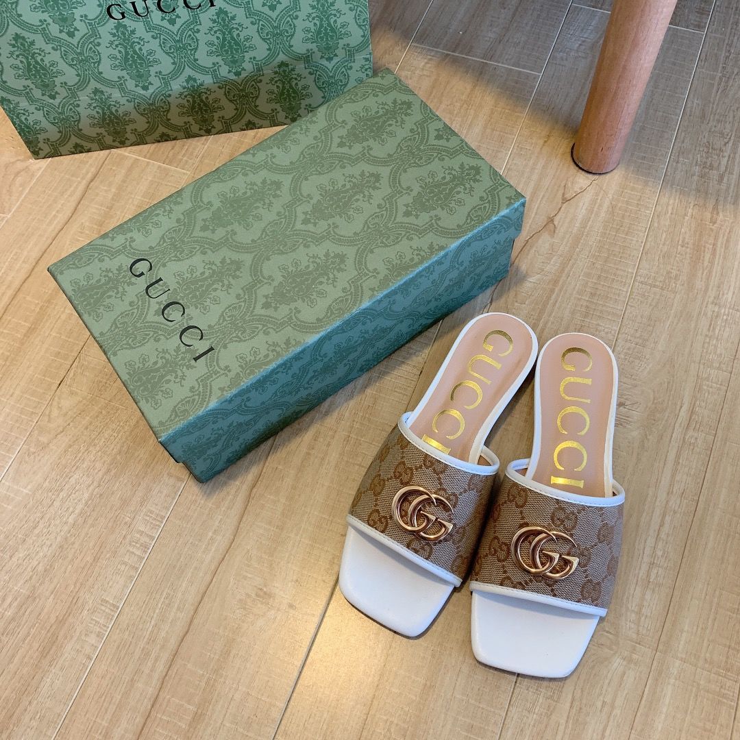 brown canvas embossed flat slippers brown canvas embossed flat slippers